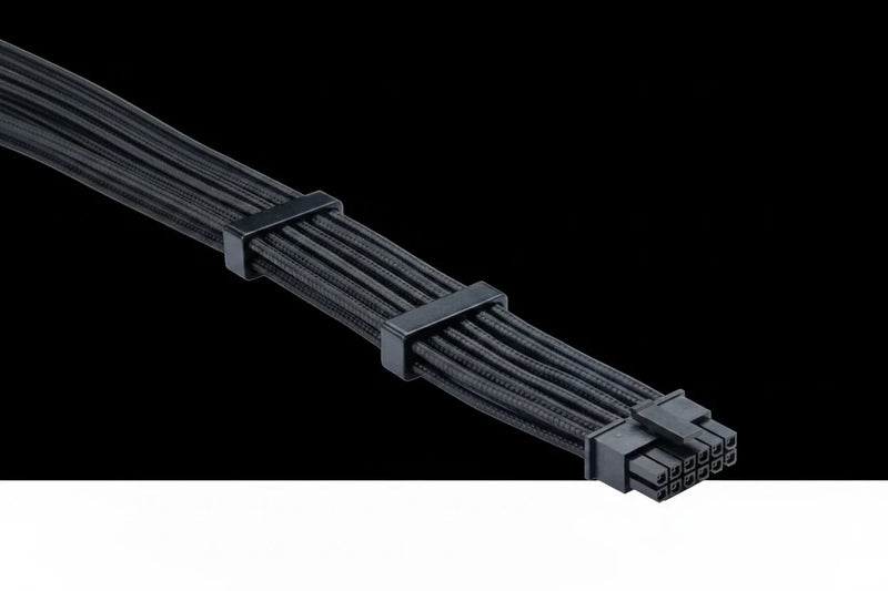 A close-up of a black multi-core power cable with black plastic zip ties and a multi-pin connector, shown against a black background with a white strip at the bottom.