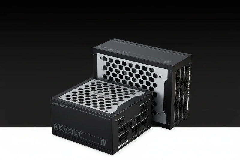 Two PC power supplies from the REVOLT series, one by PHINTEK48 in the foreground and one by ASRock in the background, shown on a black-to-white gradient studio background.